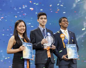 Top winner Austin Wang, 18, of Vancouver, Canada, (center) with second-place winners Kathy Liu, 17 of Salt Lake City, Utah, (left) and Syamantak Payra, 15, of Friendswood, Texas, celebrate their awards at the Intel International Science and Engineering Fair, the world's largest high school science research competition. Approximately 1,700 high schoolers from over 75 countries, region and territories competed for more than $4 million in awards this week. Winners were announced May 13, 2016, in Phoenix. (Credit: Shawn Morgan/Intel Corporation)